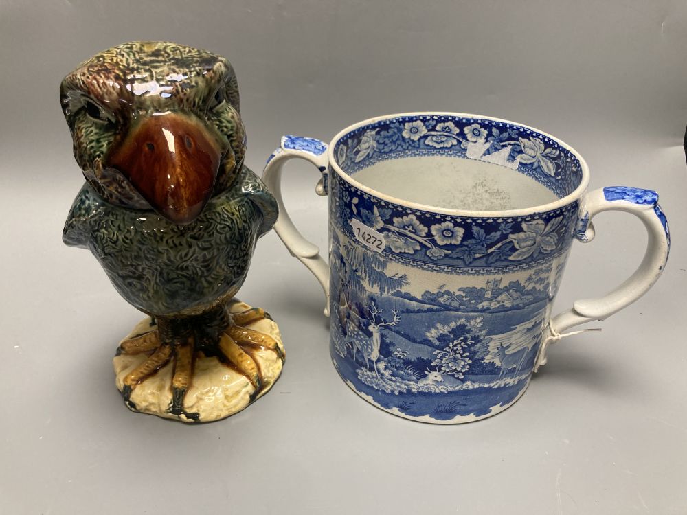 A pearlware fallow deer loving cup and a Martin Bros style bird jar and cover, height 22cm